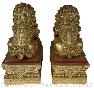 Set of Two (2) Chinese Guardian Lion Foo Dog Statues in Gilt Painted Resin. 