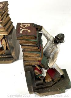 Man with Falling Book Stack K&O Co. Bookends. 5 1/2" T.