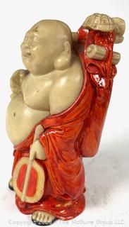 Resin Traveling Buddha Statue.  7" tall.