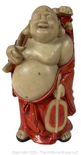 Resin Traveling Buddha Statue.  7" tall.