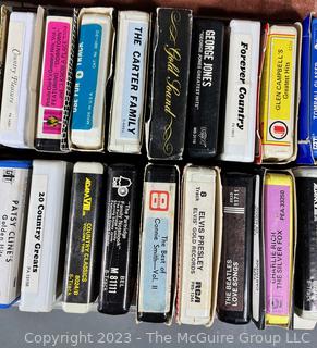 Selection of 8-track tapes, mostly Country and Western music in carrying case