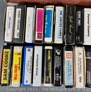 Selection of 8-track tapes, mostly Country and Western music in carrying case