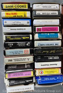 Selection of 8-track tapes, mostly Country and Western music in carrying case