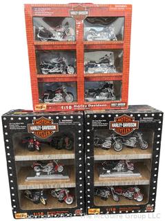 Three (3) New in Box (NIB) Harley Davidson Motorcycle Toys.