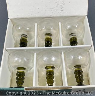 Four (4) Weighted Sterling Silver Candle Sticks and Box of Six (6) Romer German Wine Glasses.