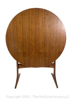 Mid Century Modern Tilting Coffee Table by Sven Engstrom & Gunnar Myrstrand Sweden. 19" tall 24" diameter. (Note: Damage to base of one leg noticed, photos posted at  and posted at 2:33pm ET 2-28)