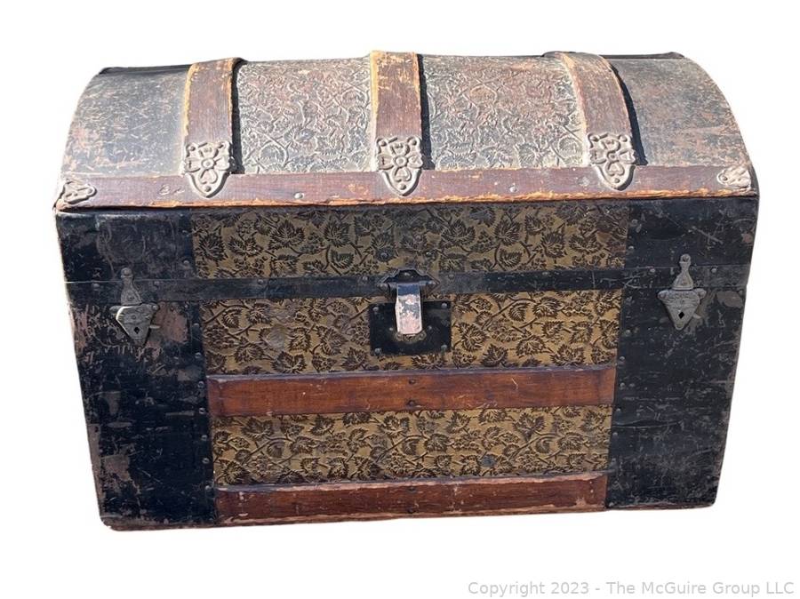 Sold at Auction: Wooden And Metal Humpback Trunk