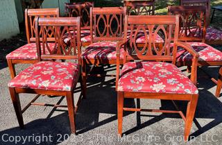 Eight (8) Chippendale Mahogany Dining Chairs, One with Arms.