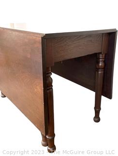 Antique Cherry Drop-Leaf Gateleg Dining Table. Leg needs to be reattached. 42" w x 21" l (59" when open) x 28" t