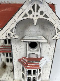 Three (3) Victorian House and Church Shaped Wooden Bird Houses.