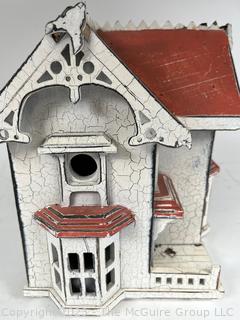 Three (3) Victorian House and Church Shaped Wooden Bird Houses.