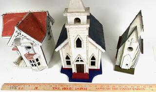 Three (3) Victorian House and Church Shaped Wooden Bird Houses.