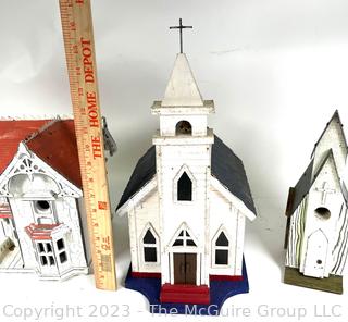 Three (3) Victorian House and Church Shaped Wooden Bird Houses.