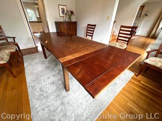 Stickley Mission Drawtop Dining Table with Two Self-Storing Leaves and Six (6) Arts and Crafts Style Dining Chairs. (one chair needs reglueing)  Table Expands from 72" to 114"L 42"W x 29"T (Note: leaves are darker than table)