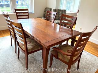 Stickley Mission Drawtop Dining Table with Two Self-Storing Leaves and Six (6) Arts and Crafts Style Dining Chairs. (one chair needs reglueing)  Table Expands from 72" to 114"L 42"W x 29"T (Note: leaves are darker than table)