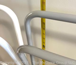 Two (2) Metal Tube Towel Racks in Grey and White.  31"T