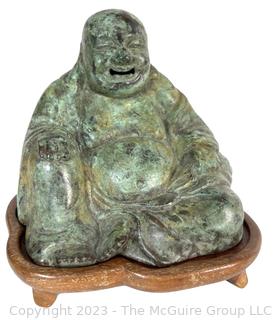 Bronze "Hotei" Statue - One of the Seven Happy Gods of Japan. Circa 1960's. On wooden plinth.