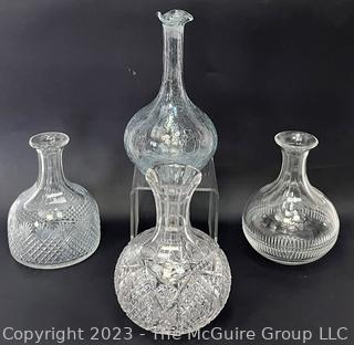 (3) Cut Glass Crystal Decanters and (1) Crackle Glass Decanter.  No Stoppers