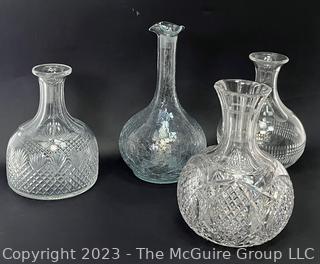 (3) Cut Glass Crystal Decanters and (1) Crackle Glass Decanter.  No Stoppers