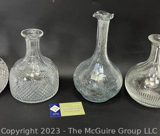 (3) Cut Glass Crystal Decanters and (1) Crackle Glass Decanter.  No Stoppers