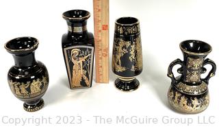 Four (4) Black, Made in Greece 24K Gold Decorated Vases. Tallest is about 7.5"