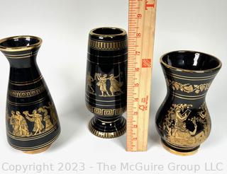 Three (3) Black, Made in Greece 24K Gold Decorated Vases.