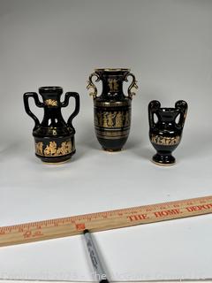 Three (3) Black, Made in Greece 24K Gold Decorated Vases. Tallest is around 9.5"