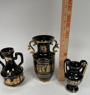 Three (3) Black, Made in Greece 24K Gold Decorated Vases. Tallest is around 9.5"