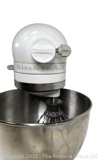 White KitchenAid Mixer with Tools and Accessories