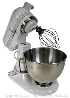 White KitchenAid Mixer with Tools and Accessories