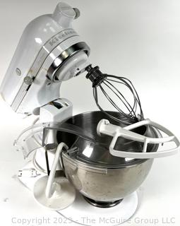 White KitchenAid Mixer with Tools and Accessories