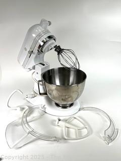 White KitchenAid Mixer with Tools and Accessories