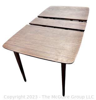 Mid Century Modern Walnut Dining Table with Leaf.  59"l x 36"w x 30"t