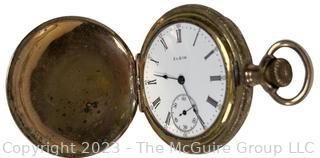 Elgin 7 Jewel Hunter Pocket Watch in 20 Year Warranted Gold Filled Case. 