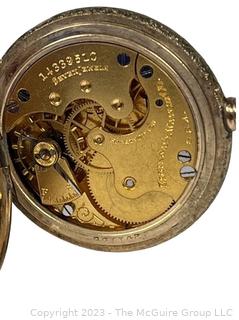 Elgin 7 Jewel Hunter Pocket Watch in 20 Year Warranted Gold Filled Case. 