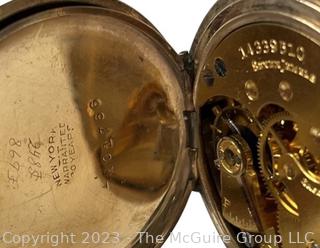 Elgin 7 Jewel Hunter Pocket Watch in 20 Year Warranted Gold Filled Case. 