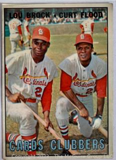 Baseball Cards of Lou Brock & Curt Flood, individual of Curt Flood, and Chipper Jones.