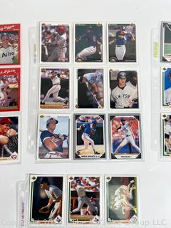 Four (4) Baseball Card Sleeves: Includes David Cone, Paul O'Neill, Don Mattingly, Deion Sanders (Did you know he played baseball?) and more!