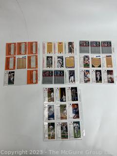 Four (4) Baseball Card Sleeves: Includes David Cone, Paul O'Neill, Don Mattingly, Deion Sanders (Did you know he played baseball?) and more!