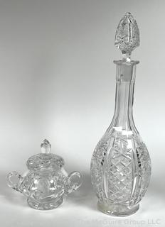 Two (2) Pieces of Cut Clear Crystal Glass Including Decanter and Jar with Lid. 