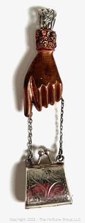 Copper Hand Holding Sterling Silver Locket Purse Pendant.