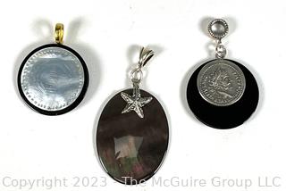 Three (3) Pendants Made With Onyx, Mother of Pearl and Abalone with Sterling Silver Bales. 