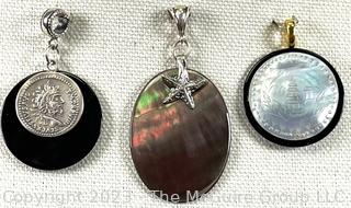 Three (3) Pendants Made With Onyx, Mother of Pearl and Abalone with Sterling Silver Bales. 