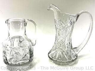 Two (2)  Cut Clear Crystal Glass Pitchers. 