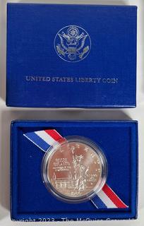 U S Mint 1991 Korean War Memorial Coin (Uncirculated Silver Dollar); U.S. Mint 1986 Liberty Silver Dollar (90%), U.S. Mint Congressional Coin 1989 Half Dollar Proof, U. S. Mint 1993 Silver American Eagle $1 Proof Coin, U.S. Mint 1982 George Washington Commemorative Half Dollar Coin 1732-1982 (90% silver)