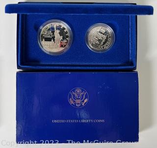 1986 United States Liberty Silver Dollar/Half Dollar Coin Set; and 1986 United States Liberty Silver Dollar Coin 