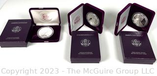 Three 1 OZ 99.9% silver "American Eagle" proof coins in presentation boxes (1993)