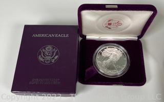 Three 1 OZ 99.9% silver "American Eagle" proof coins in presentation boxes (1993)