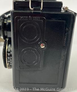 Two (2) Vintage Cameras Including a Kodak Baby Brownie Special and a Soviet LOMO Lubitel 2 Twin Lens Reflex Camera. 