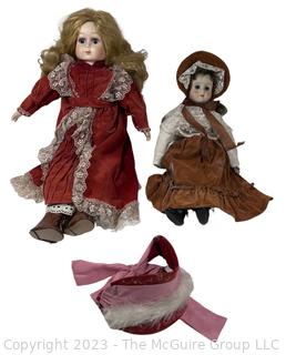 Two (2) Vintage Dolls with Porcelain Heads and Cloth Bodies. 